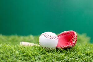 Baseball is on green grass